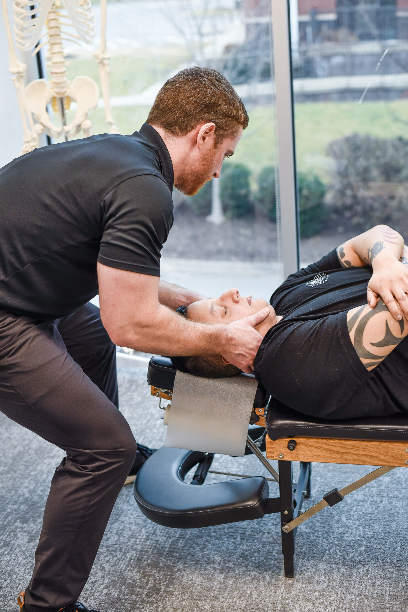 Dr. Joe McLeighton adjusting a patient's neck at Inner Strength Chiropractic in Franklin, TN
